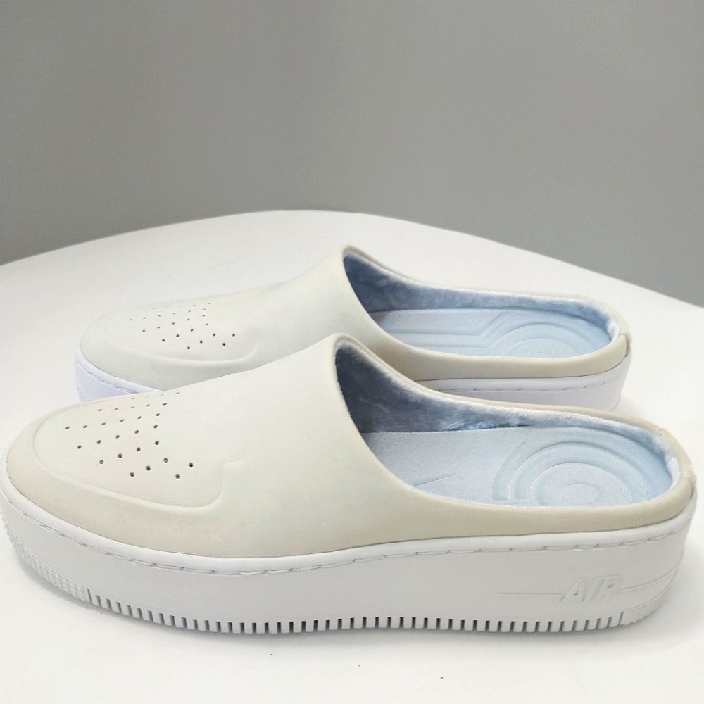 Nike Women’s White Slip-On Platform Sneakers